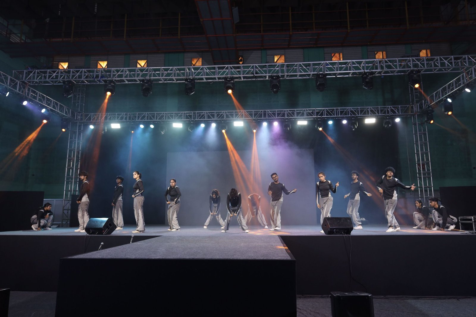 College student performing live on stage captured at college function