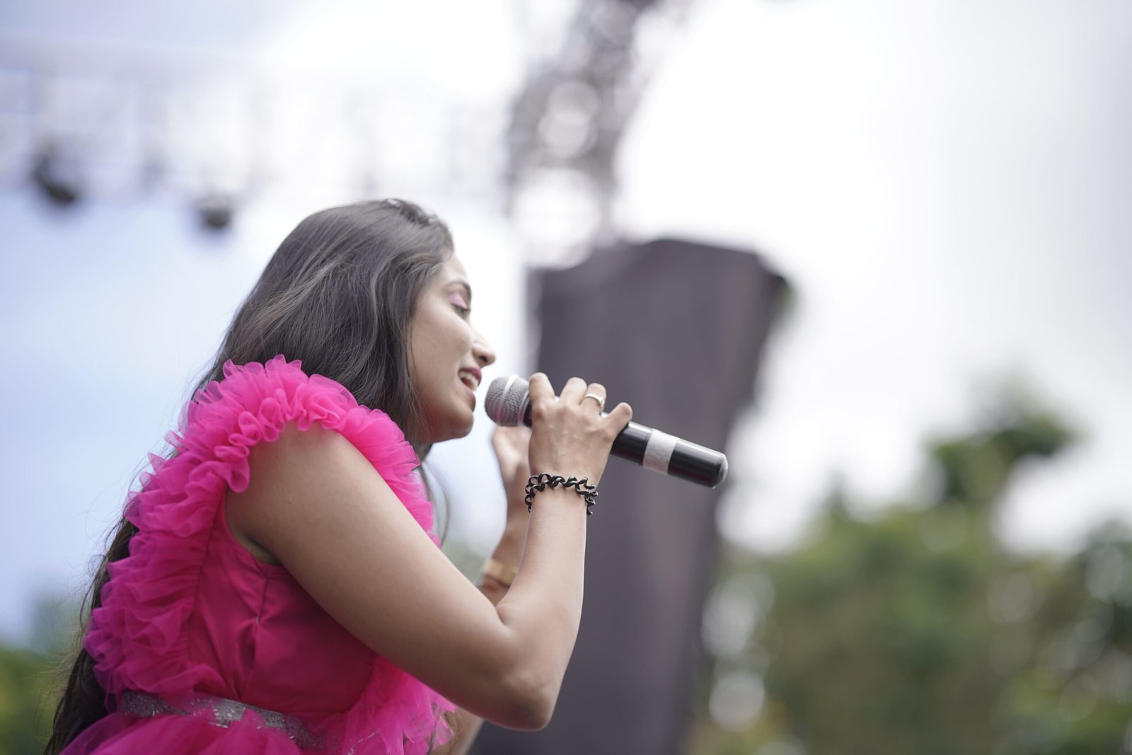 Female Artist performing at college fest captured by our team